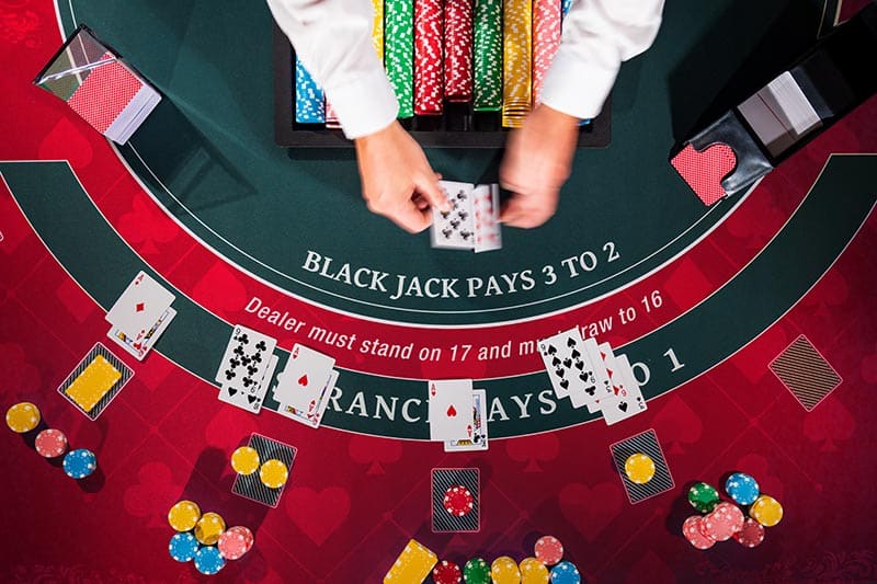 Overhead view with dealer hands of a Casino Black Jack table